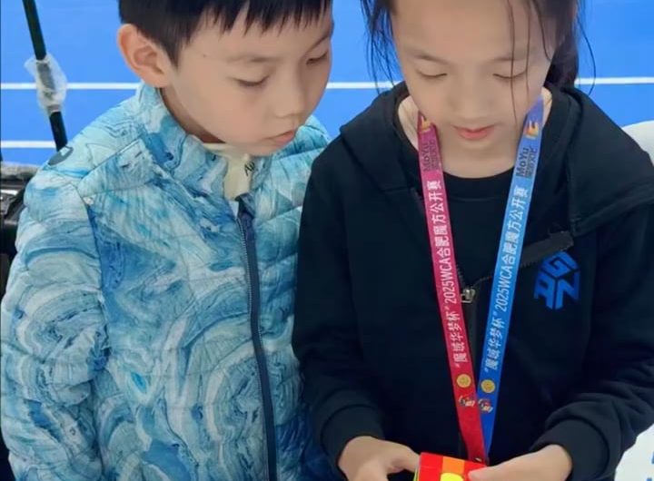 2 world record holders. 1 cube.