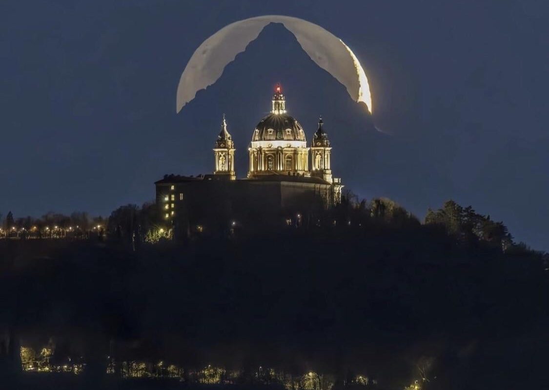 6 years of patience for one perfect shot,  moon, mountain and basilica perfectly aligned.