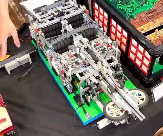 A LEGO creator in Japan built a fully automated paper-airplane machine from scratch.