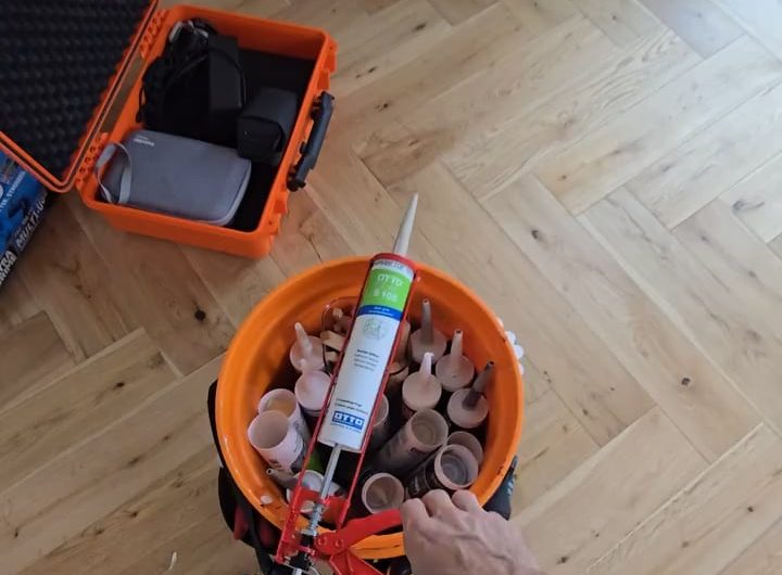 Applying bathroom sealant