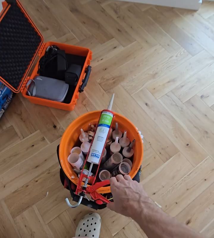 Applying bathroom sealant