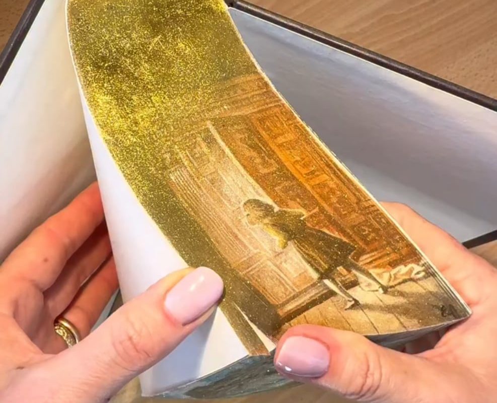 Art work on edges of the book "The chronicles of Narnia"