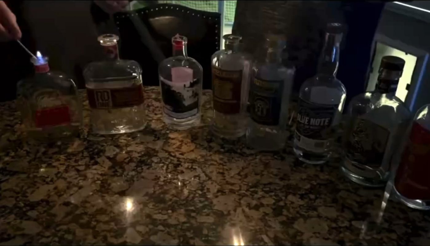 Burning off alcohol vapours in empty bottles