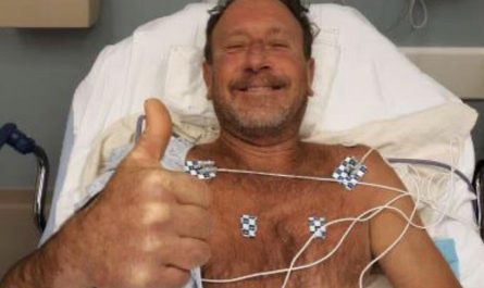 Cape Cod lobster diver flashes a thumbs up from his hospital bed after surviving being swallowed and spit out by a humpback whale.