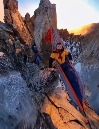 Climber shows his sleeping setup