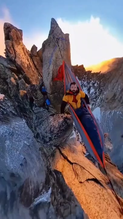 Climber shows his sleeping setup
