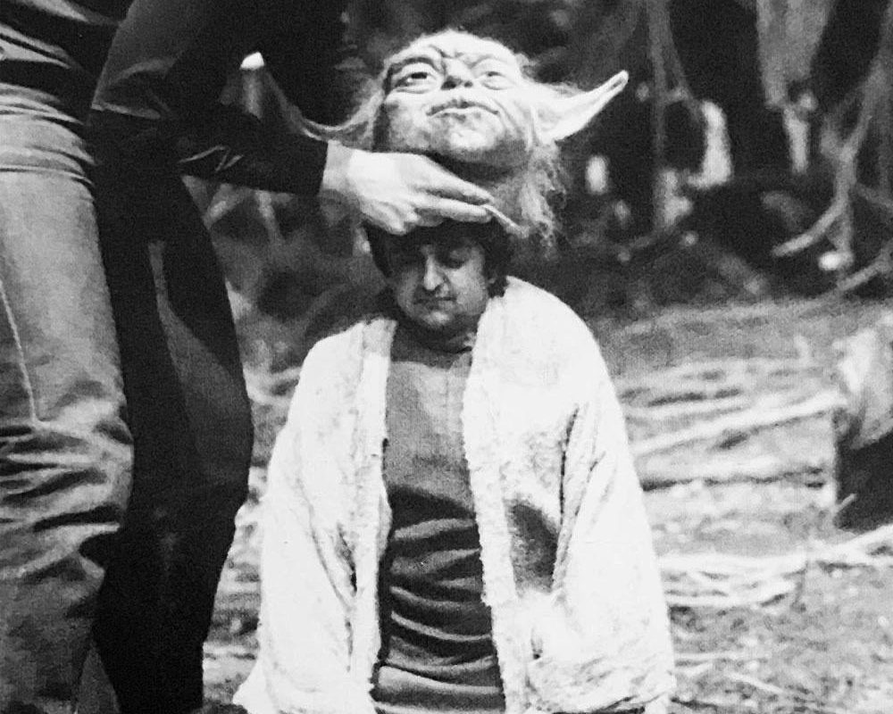 Deep Roy, who shows up in everything, played Yoda in a few walking shots in The Empire Strikes Back.