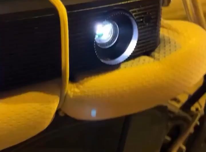 Dude puts a projector in his bike and projects a horse sidekick