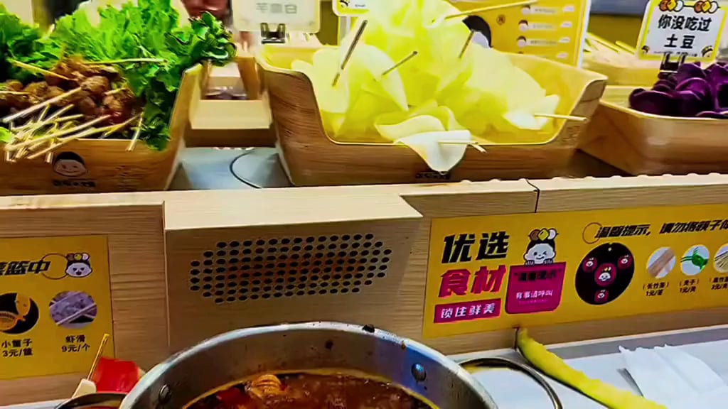 Evenly spaced droplets form as water drops from this dangling potato slice.