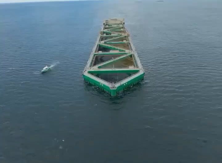 Havfarm 1 is an offshore salmon farm  about 5 km southwest of Hadseløya, Norway. At 385 m long and 59.5 m wide, it is the world’s largest semi-submersible structure ever build. It has a capacity to host 10,000 tons of salmon.