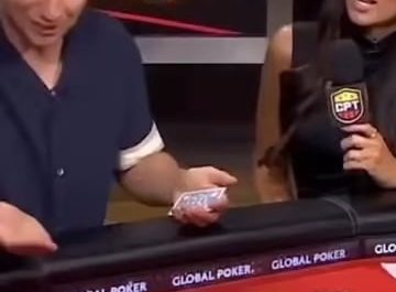 Just when you think you've seen it all, this magician pulls another card out of thin air