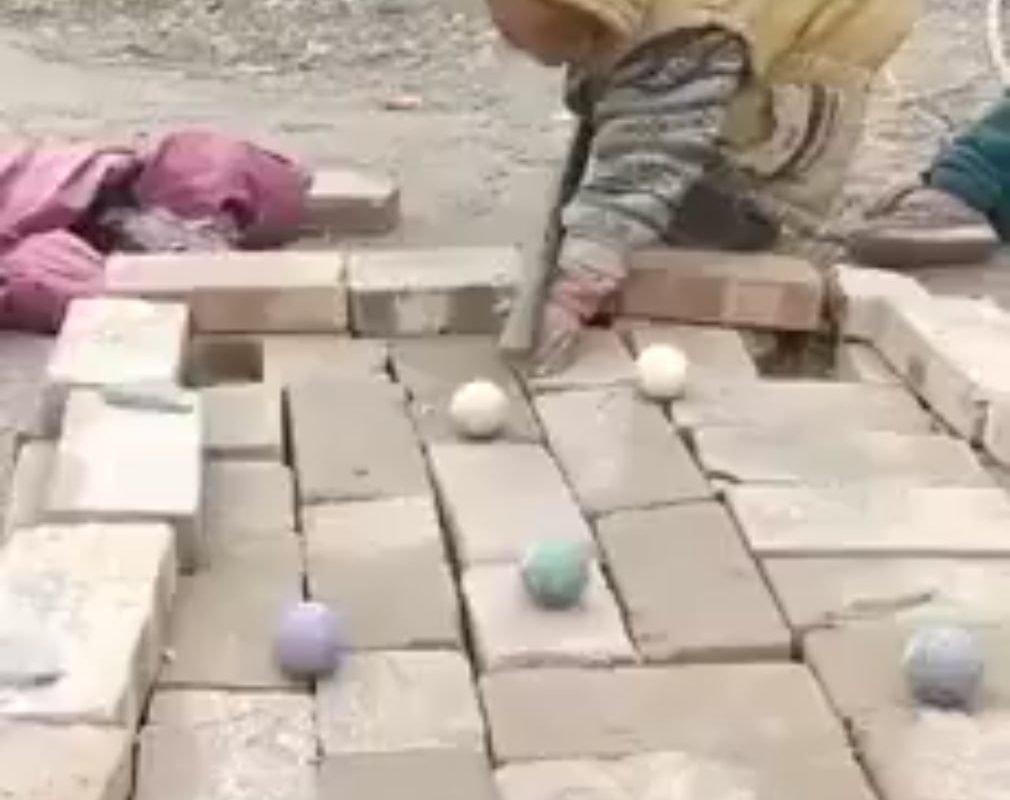 Kids built their own billiards table out of bricks