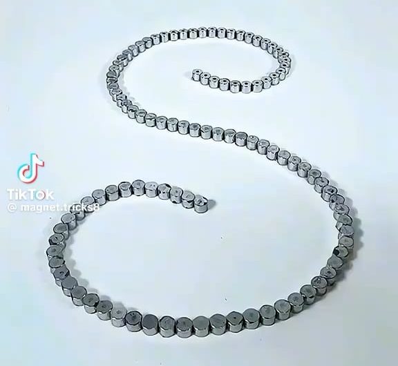 Magnets snapping into place like reverse dominoes