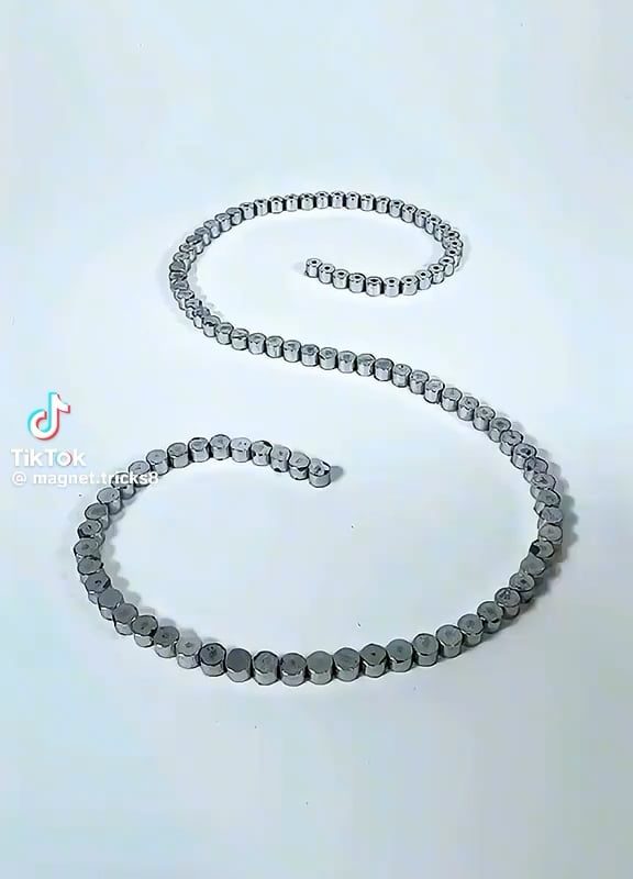 Magnets snapping into place like reverse dominoes