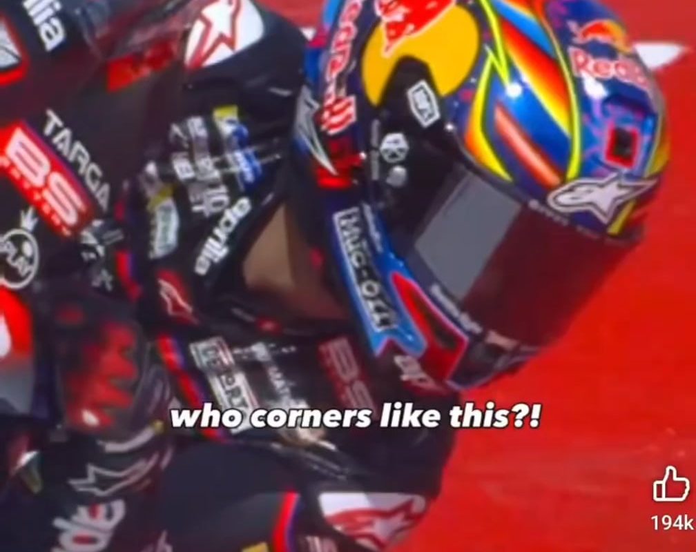 MotoGP rider leaning Into a turn