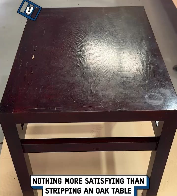 Paint stripping an old wooden table