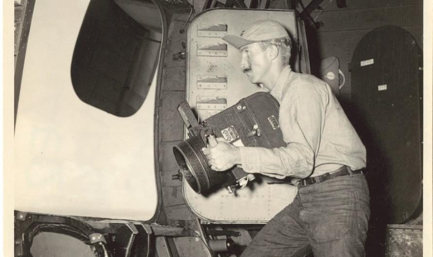 Photographer in plane taking photos of Atomic Bomb Test Bikini Atoll, circa 1946