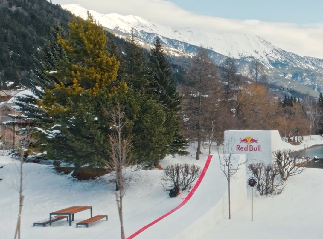 Pierre Vaultier riding a pumptrack on a lake