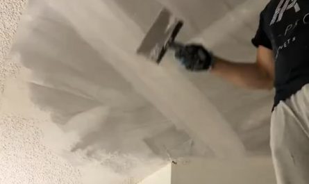 Removing that terrible popcorn ceiling at last. Lovely on many levels
