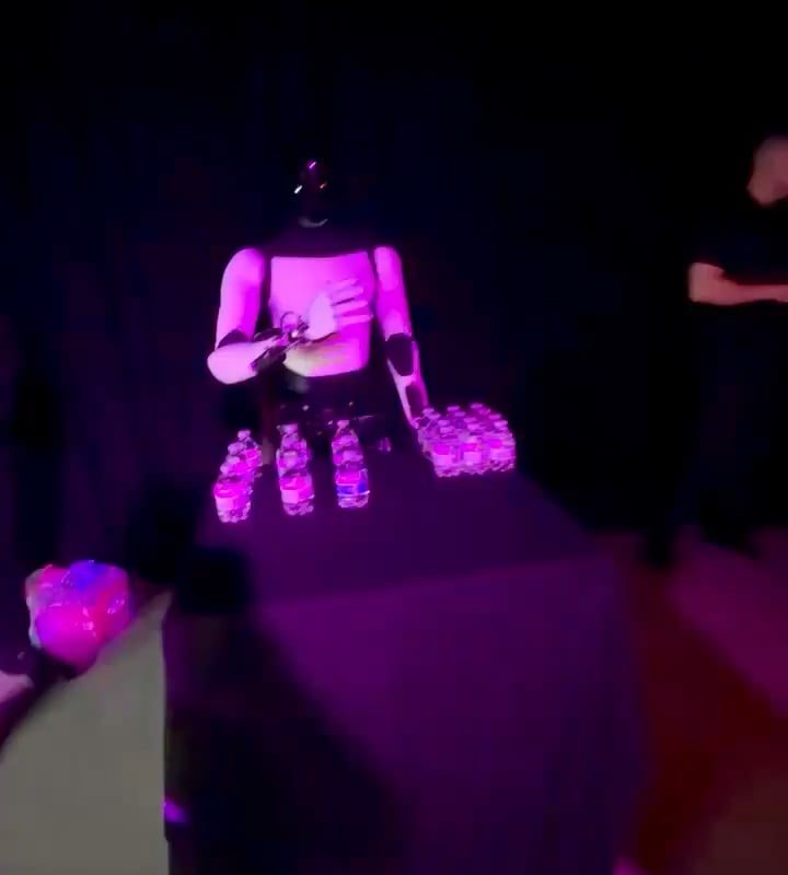 Robot shuts down after reproducing the gesture of its human operator removing their headset.