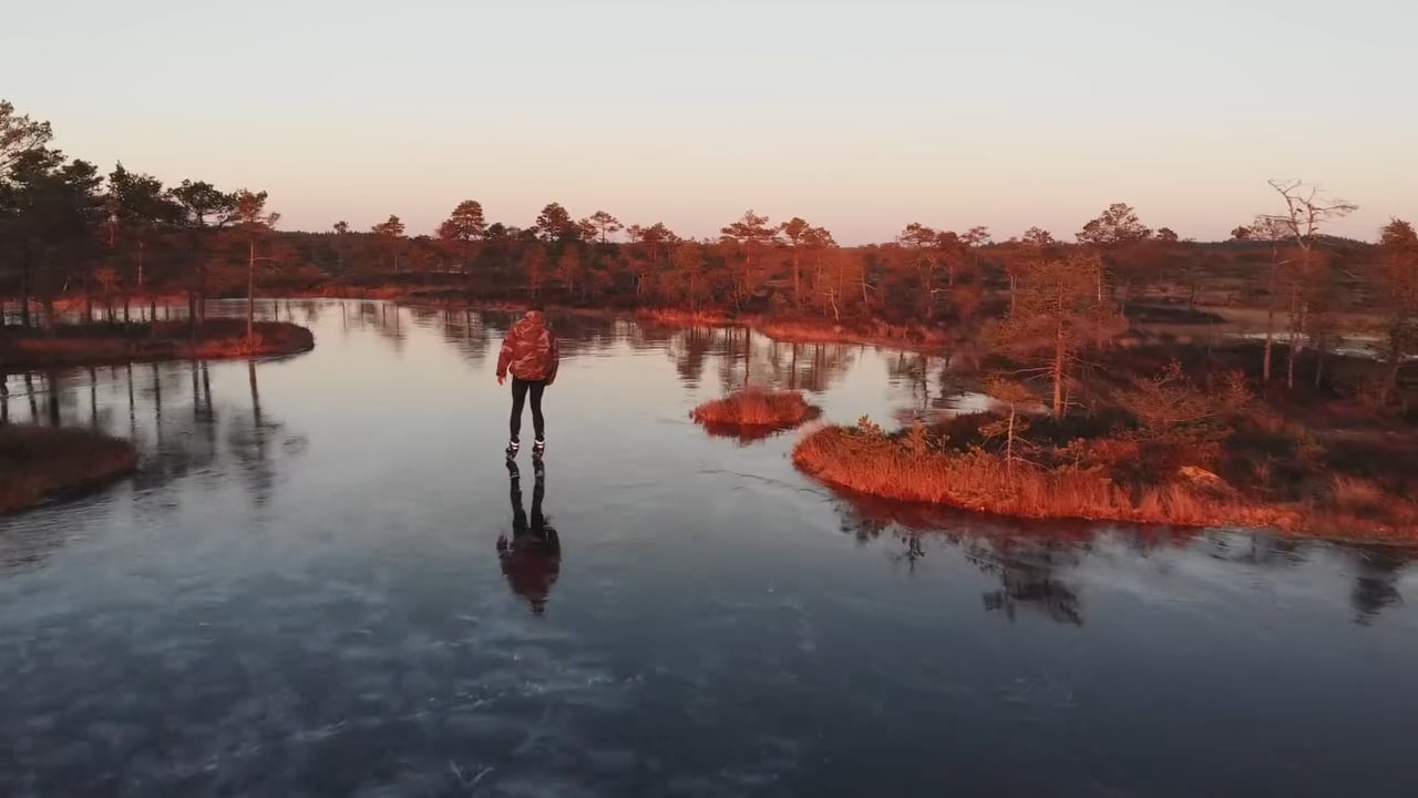Skating on freshly frozen bog ice trail