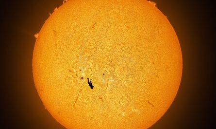 Skydiver in front of Sun. Astrophotographer Andrew McCarthy spent months of preparation and six attempts getting this shot.
