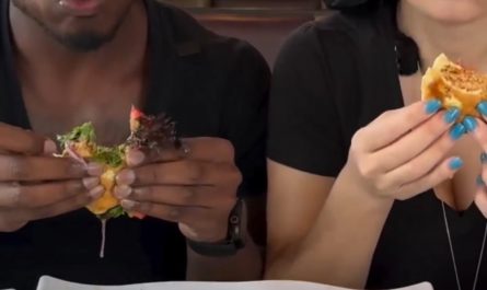 Someone crashed their SUV through the window while Man & Woman were eating doing a food review in the restaurant.