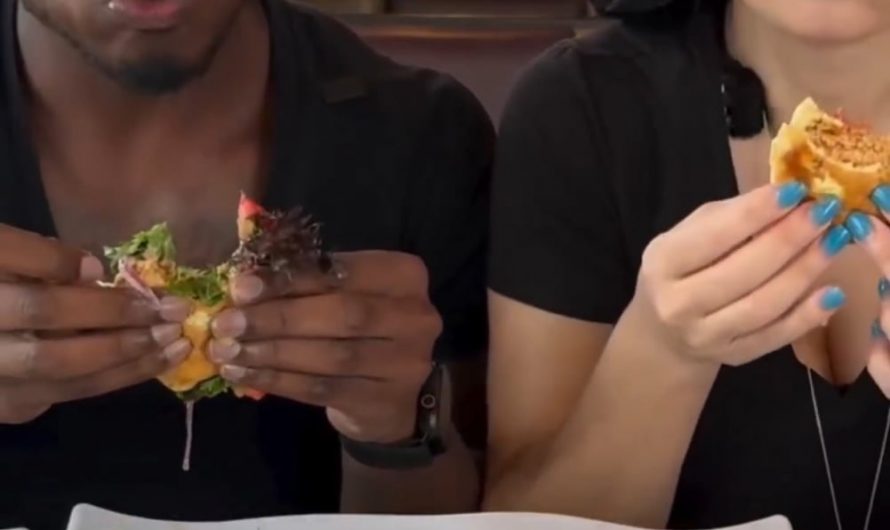 Someone crashed their SUV through the window while Man & Woman were eating doing a food review in the restaurant.