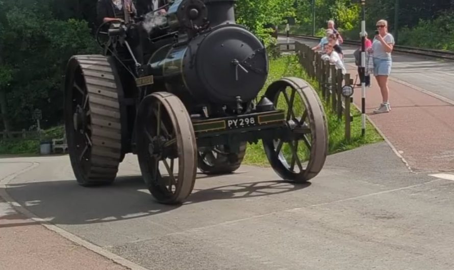 Steam-powered vehicles travelling around the Beamish Open Air Museum in County Durham, England
