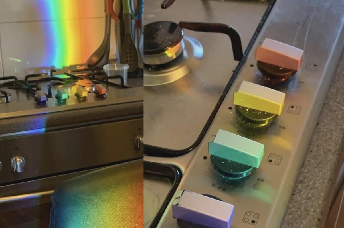 Sunlight colors align perfectly on stovetop knobs