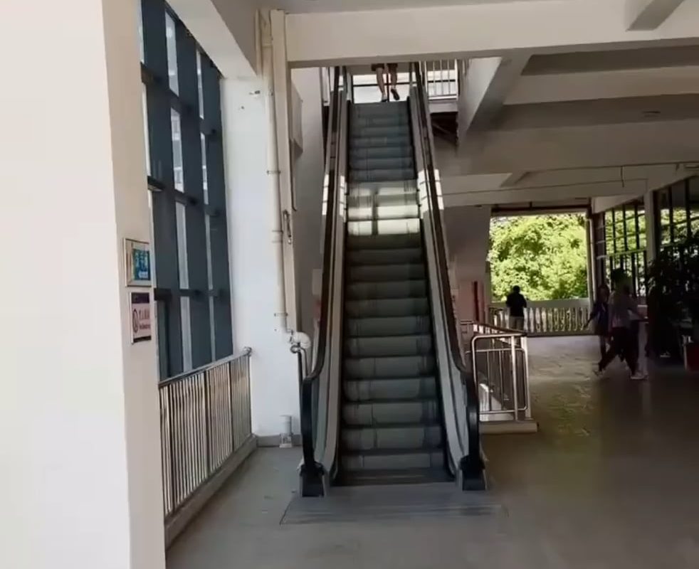 Sunlight falling on a escalator