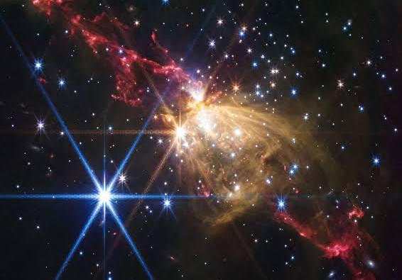 The James Webb Space Telescope captured a stunning image of a massive stellar jet from a newborn star in the nebula Sharpless 2-284. The jet, resembling a double-bladed lightsaber, spans over 8 light-years and comes from a young star about ten times the mass of our Sun.