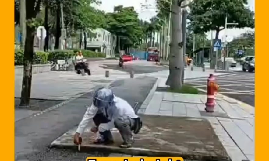 The “Shenzhen measuring tape guy” is a man who has gone viral for documenting and reporting road and sidewalk defects in Shenzhen, China, using a measuring tape. His videos of issues like uneven curbs and potholes, shared online, have led to the city promptly fixing the problems
