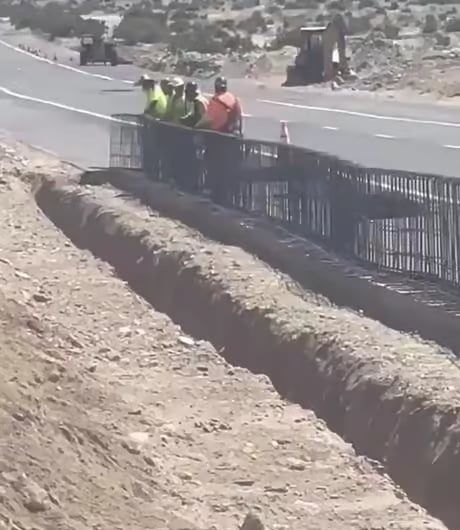 The concrete boys finishing up installing the rebar.