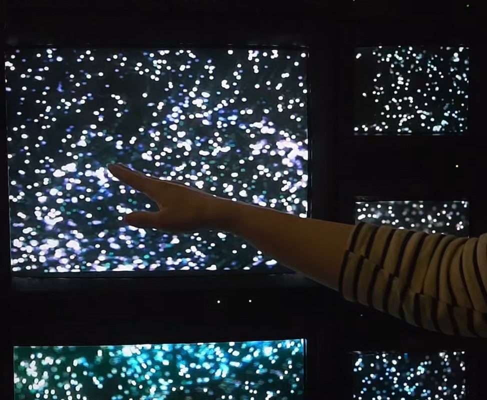 The interactive particles on this CRT Wall Setup