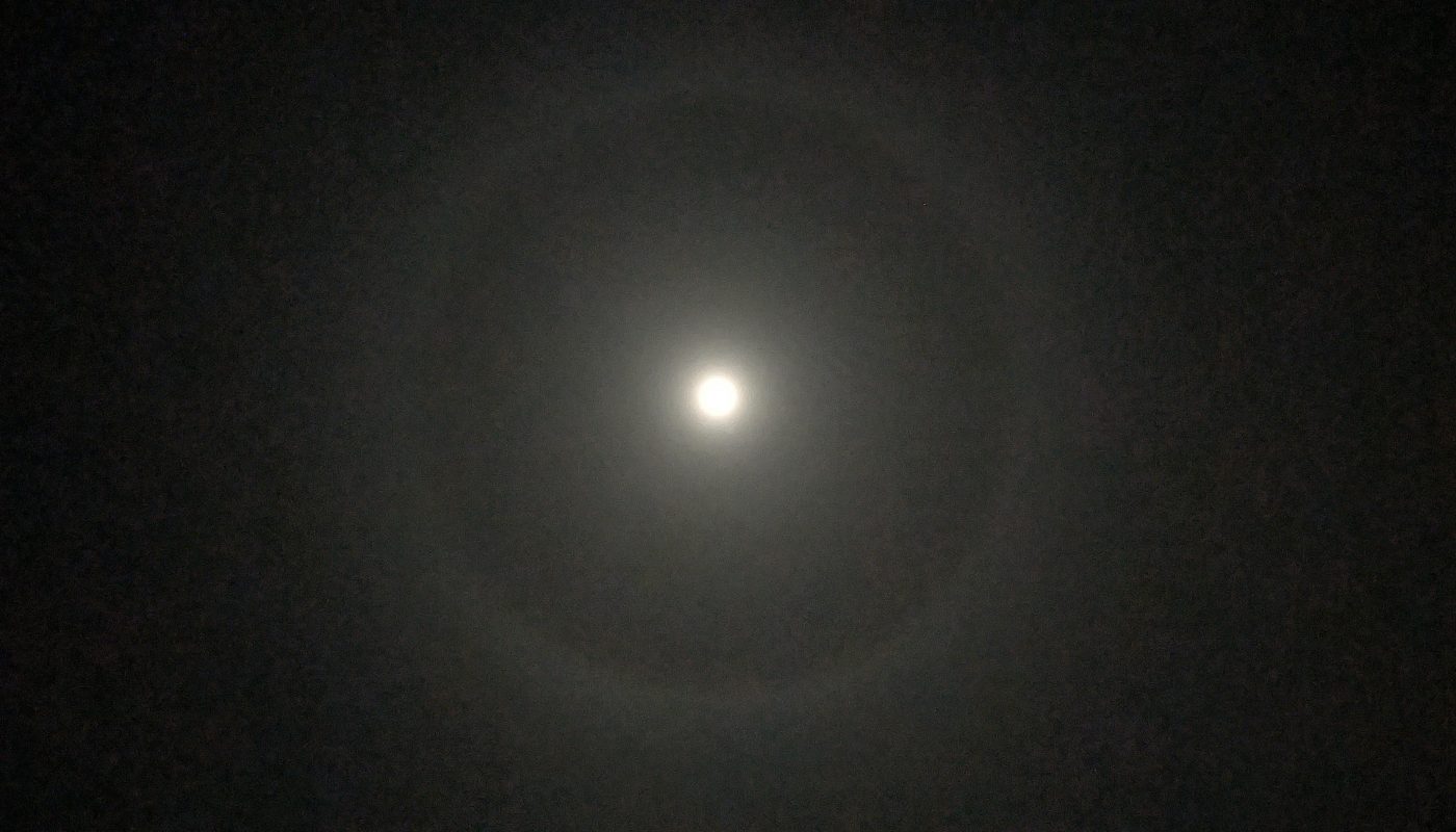 The moon with a weird halo thingy (there's probably an actual explanation and scientific name for this) (not camera lens weirdness as I can see it with my naked eye too) Bristol, UK.