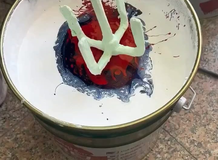 The process of mixing paint