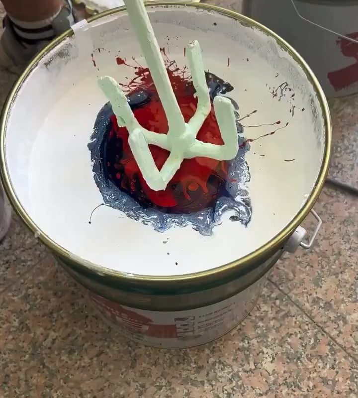 The process of mixing paint
