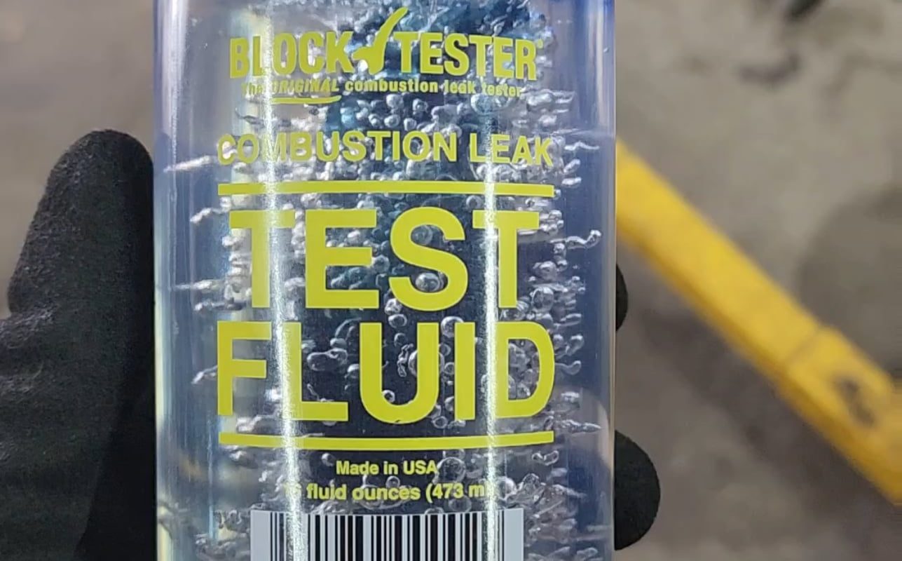 The reactive fluid in this combustion leak tester separated from the water and compressed into the center by the frozen water when I left the bottle in the garage during winter.