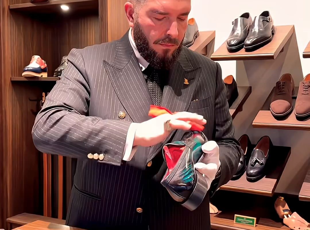 The smooth handling and rich, deep color of these royal green penny loafers.