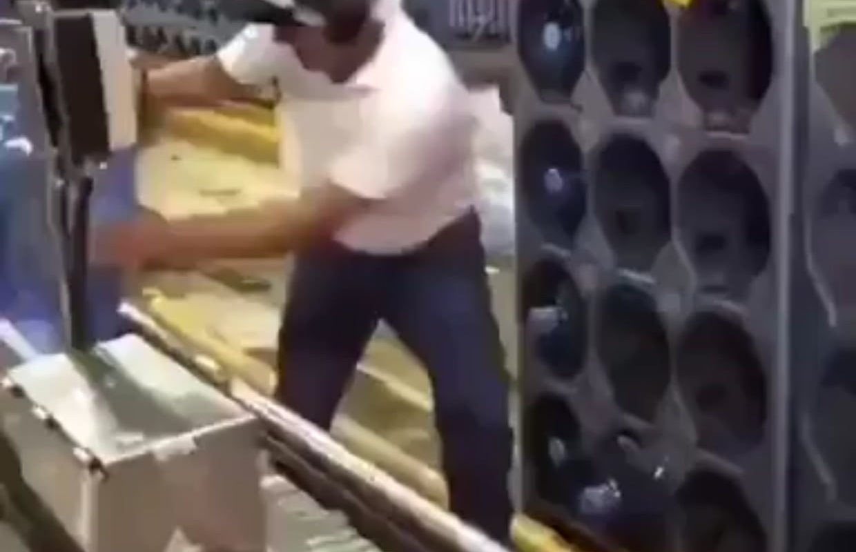 The way he stacks those water bottles