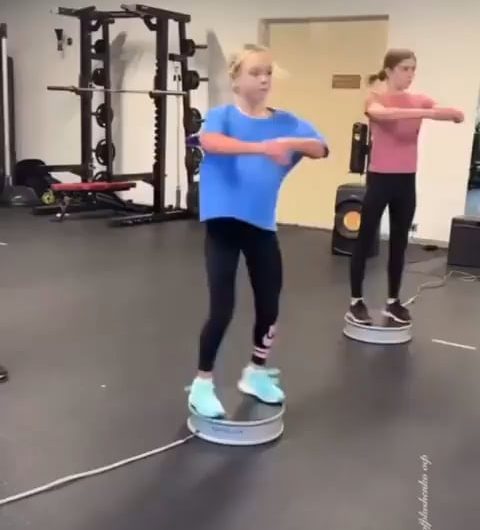 This girl has unbelievable balance on spin cycle and repeat