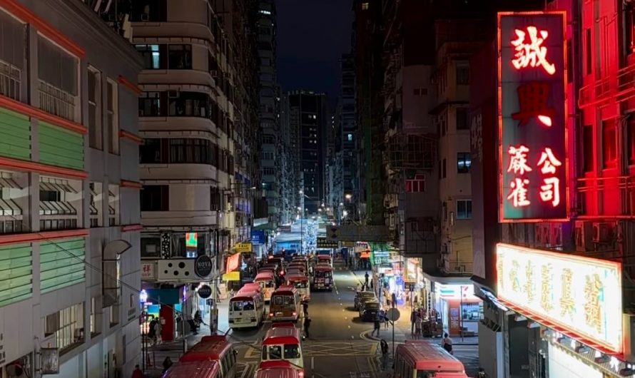 Timelapse of Hong Kong vehicles and people moving around at night