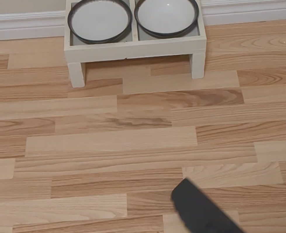 Vacuum fits perfectly under my home made dog food tray. Built the tray before I owned the vacuum.