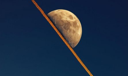 When a jet's contrail lined up perfectly with the moon.