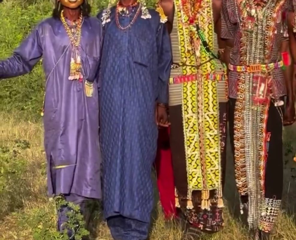 Wodaabe men wearing makeup and elaborate costumes use striking facial expressions, rhythmic chattering and a series of dances in an elaborate, centuries-old courtship ritual at the Gerewol Festival in Chad