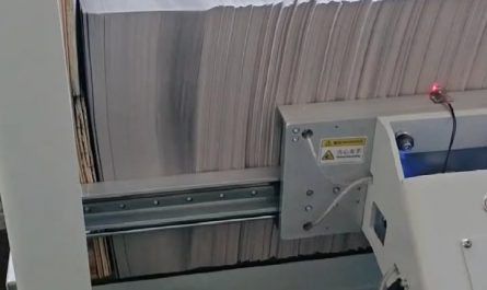 a machine that organizes a stack of paper