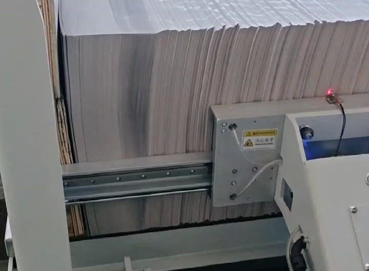 a machine that organizes a stack of paper