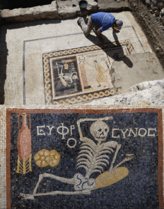 2,400 year-old mosaic featuring a reclining skeleton with a loaf of bread and a wine jug with the caption: “Be cheerful, enjoy your life" discovered in ancient city of Antioch (southern Turkey) -an ancient reminder of mortality & the importance of living life fully