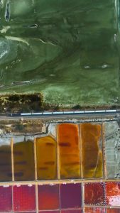 A Train passing through the salt extraction area of sambhar Lake in the Indian state of Rajasthan